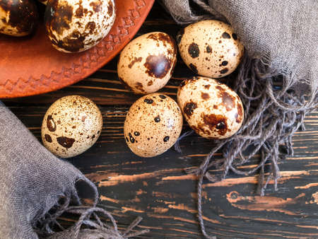 quail eggs on wooden backgroundの写真素材