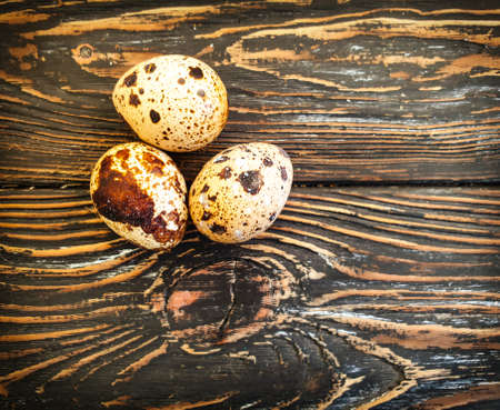 quail eggs on wooden background easter, fragilityの写真素材