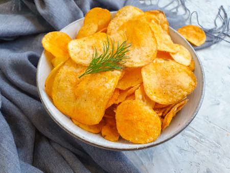plate with chips on a concrete background