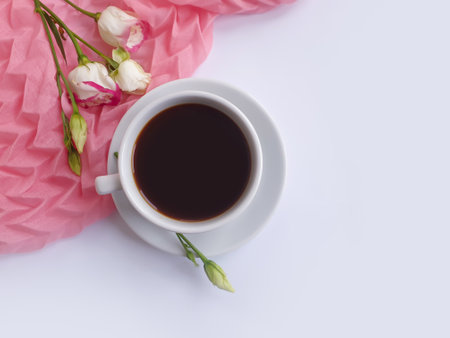 cup of coffee flower rose on a colored backgroundの写真素材