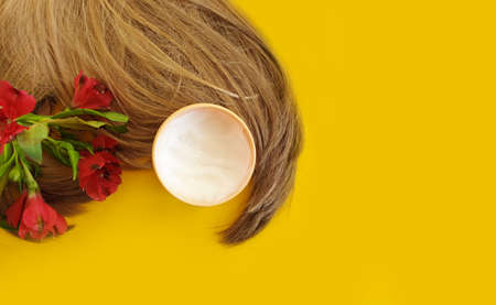 cosmetic hair mask on a colored background