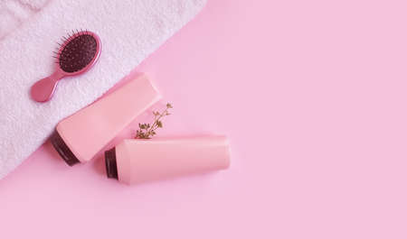 shampoo, comb on a colored backgroundの写真素材