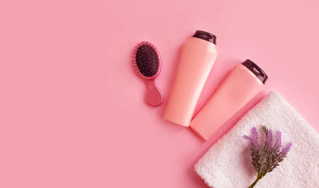 shampoo, comb on a colored backgroundの写真素材