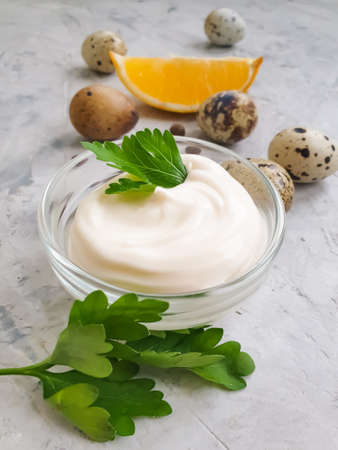 homemade mayonnaise, quail eggs on a  backgroundの写真素材