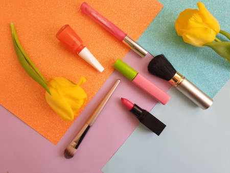 decorative cosmetics, tulip flower on a colored backgroundの写真素材