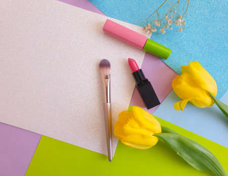 decorative cosmetics, tulip flower on a colored backgroundの写真素材