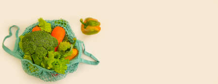 fresh vegetables in eco bag on white backgroundの写真素材