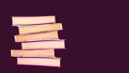 stack of book on dark background