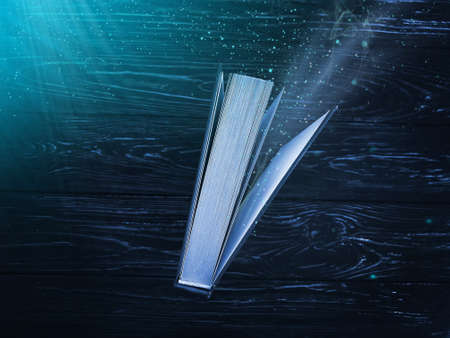 old magic books on black backgroundの写真素材
