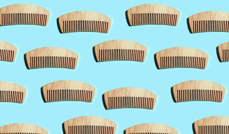 wooden comb on a colored backgroundの写真素材