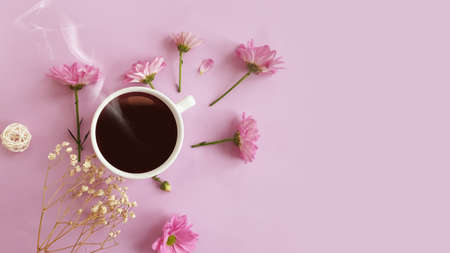 coffee cup, flower on colored backgroundの写真素材