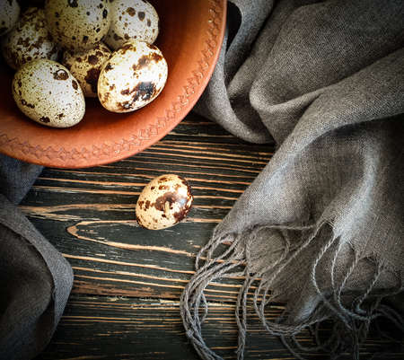 quail egg on wooden background