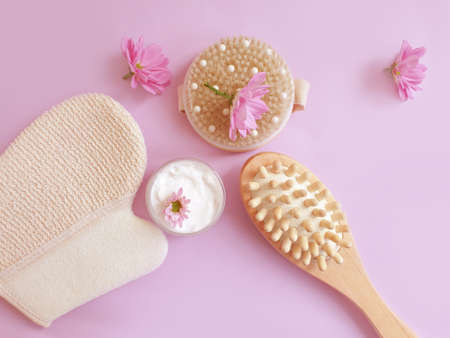 massage brush, flower on a colored backgroundの写真素材