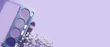 eyeshadow brush flower on colored backgroundの写真素材