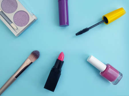 decorative cosmetics, mascara, lipstick,  on a colored backgroundの写真素材