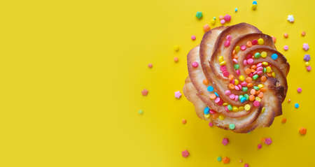 festive cupcake on a colored background