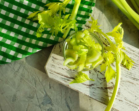 fresh celery on concrete background