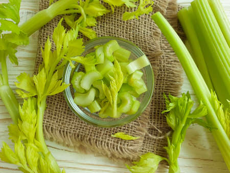 fresh celery on wooden background natural, ingredient