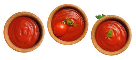 ketchup in wooden isolated on white backgroundの写真素材