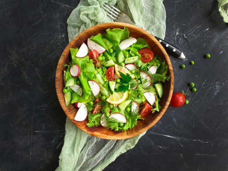 salad in a plate on a concrete backgroundの写真素材