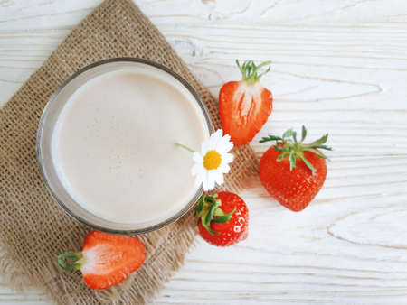 fresh milk, strawberries on wooden backgroundの写真素材