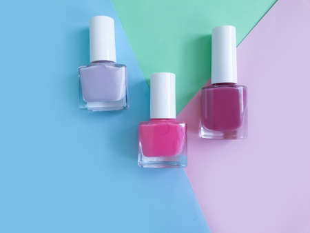 nail polish bottle on a colored backgroundの写真素材