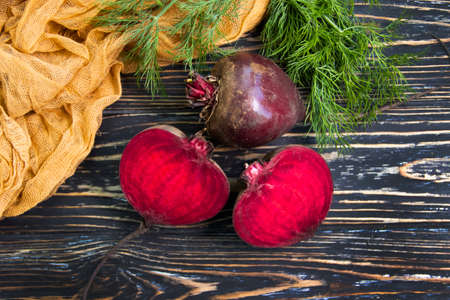 whole beet on a wooden backgroundの写真素材