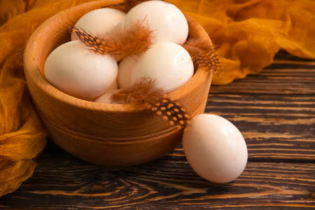 raw eggs on wooden background farm, protein