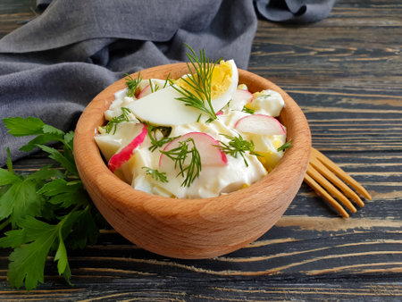 salad egg, radish, dill on wooden backgroundの写真素材