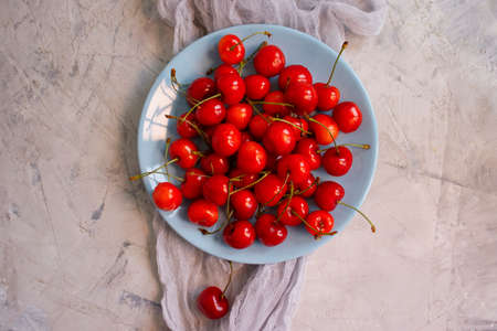 ripe cherry on a concrete backgroundの写真素材