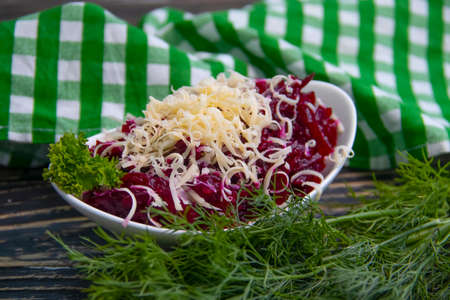 beet salad, cheese on wooden backgroundの写真素材