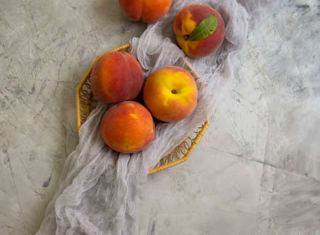 fresh peaches on concrete backgroundの写真素材