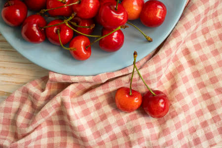 fresh cherries on concrete backgroundの写真素材