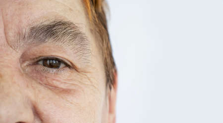 eyes of an elderly woman close upの写真素材