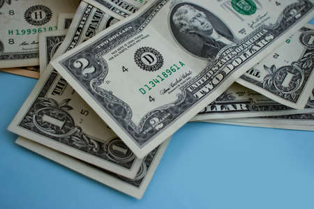 dollar bills on a colored backgroundの写真素材