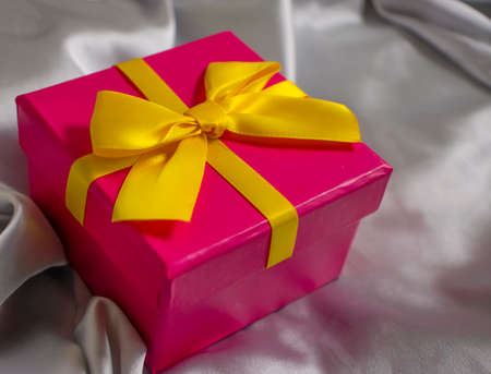 gift box on silk backgroundの写真素材