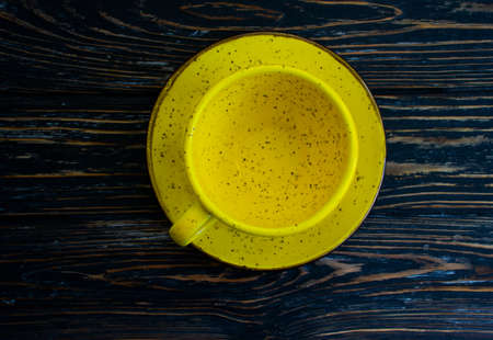 empty cup on wooden background