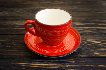 empty cup on wooden backgroundの写真素材