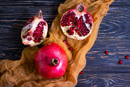 pomegranate fruit on wooden backgroundの写真素材