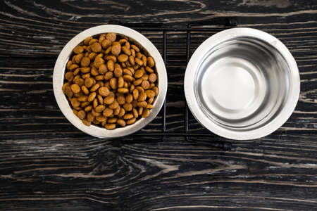 dry food for cats on a wooden backgroundの写真素材