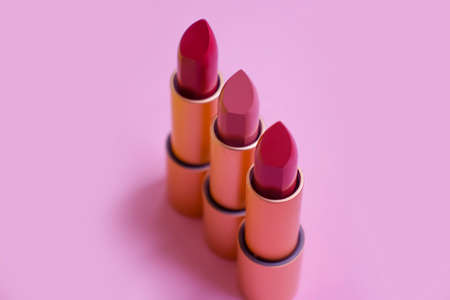 lipstick on colored cosmetics backgroundの写真素材