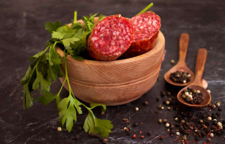 sausage salami, spices on concrete backgroundの写真素材