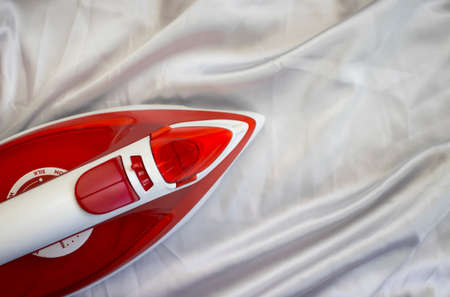 iron on silk background clothingの写真素材