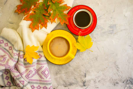coffee cup autumn leaf on wooden backgroundの写真素材