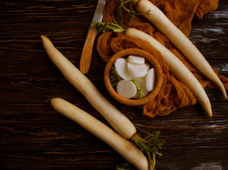 chinese radish on wooden backgroundの写真素材