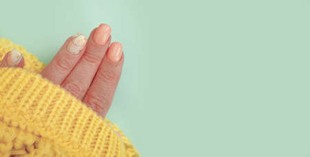 female hand with beautiful manicure cloth modernの写真素材