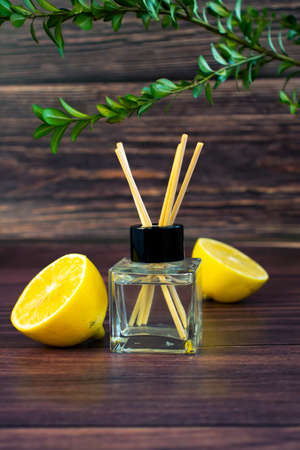 aroma diffuser, lemon on a wooden backgroundの写真素材
