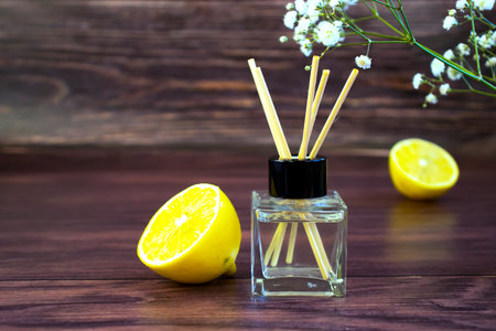 aroma diffuser, lemon on a wooden backgroundの写真素材