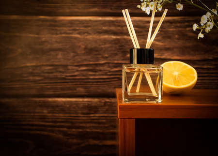 aroma diffuser, lemon on a wooden backgroundの写真素材