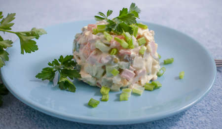 traditional olivier salad in a dish